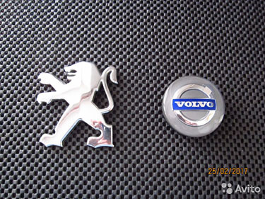 Эмблемы фирменные Volvo и Peugeot